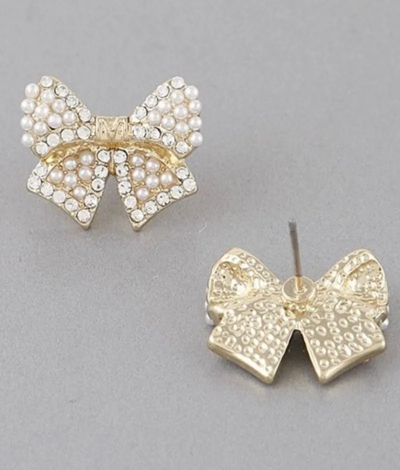 Bow stud Earrings with gold and pearl detail