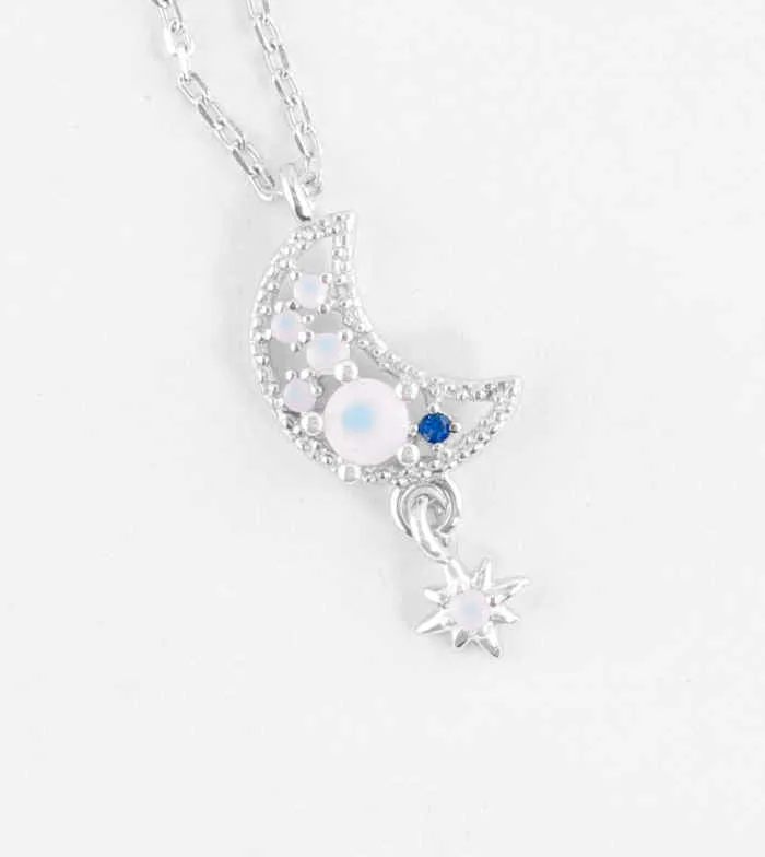 Crescent Moon And Dangling Star Necklace with Cubic Zirconia