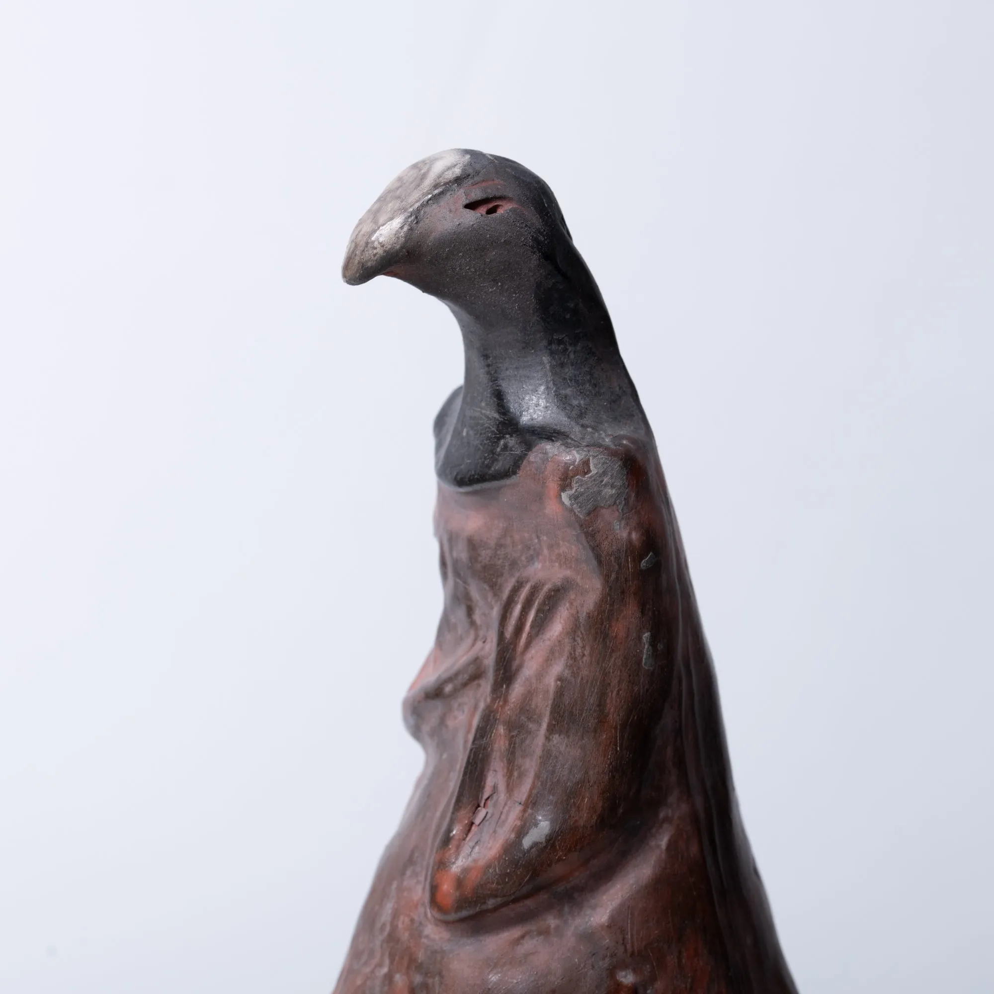 Handcrafted Bird Sculpture on Wooden Stand